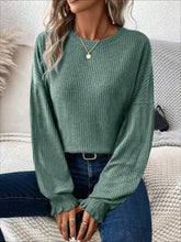Ribbed round neck lantern sleeve T-shirt in muted green with ruffled cuffs