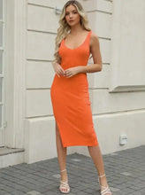 Vibrant orange ribbed slit sleeveless knit midi dress, fitted silhouette
