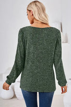 Woman in dark green ribbed square neck long sleeve T-shirt