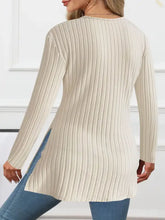 Cream ribbed surplice long sleeve tunic with side slits, slightly stretchy