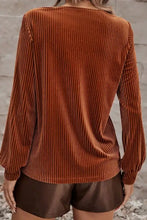 Rust brown ribbed zip long sleeve t-shirt with elasticated cuffs and faux leather shorts