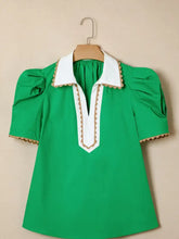 A vibrant green ricrac trim color block patchwork short sleeve blouse with white collar and beige scalloped edges
