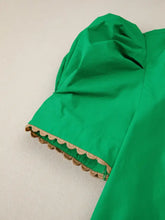 Vibrant green color block patchwork short sleeve blouse with sleeve blouse featuring ricrac trim and scalloped lace details