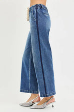 Blue denim risen jeans wide-leg jeans with elastic band high rise cropped design and dark blue vertical stripe