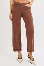 Brown wide-leg cropped jeans with rolled cuffs and classic five-pocket design in risen tummy control mid barrel baggy style
