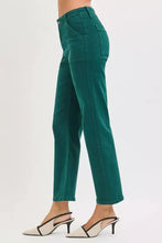 Emerald green risen high rise ankle flare straight-leg trousers with modern cut and subtle stitching details