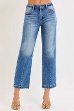 Risen high rise crop boyfriend tapered jeans in medium blue wash denim with subtle whiskering details