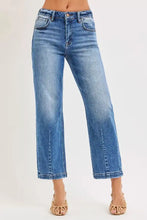Risen high rise crop boyfriend tapered jeans in medium blue wash denim with high-waisted and straight-leg cut