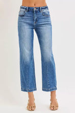 Risen high rise crop boyfriend tapered jeans in medium blue wash denim with straight leg and rolled cuffs