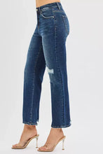 Risen high rise slim straight blue denim jeans with distressed knee tear frayed hem and hidden knee patch