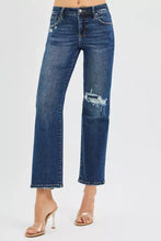 Dark blue denim risen high rise crop slim straight jeans with distressed thighs frayed hems and hidden knee patch
