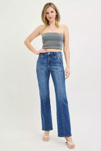 Risen high rise blue denim jeans with straight leg cut and visible stitching details in high rise straight design