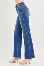 Blue denim risen high rise straight patch pocket seamed jeans with high waist and classic stitching