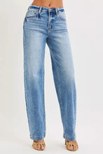 Light-wash denim risen high rise wide baggy jeans with a wide baggy cut and rolled cuffs for casual wear