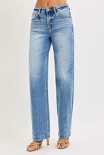 Risen high rise wide baggy jeans in light blue denim with a straight-leg cut and subtle fading