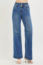 Risen high rise wide leg blue denim jeans with button closure and wide band detail for a stylish fit