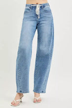 Light-wash denim wide-leg jeans with high-rise drawstring waist in risen relaxed fit style for casual wear