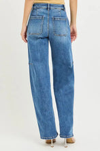 Back side of risen slouchy baggy jeans in blue denim with wide-leg cut and two back pockets