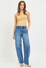 High-waisted blue denim risen slouchy baggy jeans with a relaxed wide-leg cut for casual wear