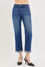 Blue denim risen slouchy cropped boyfriend jeans with straight-leg cut and rolled cuffs featuring cuffed hem