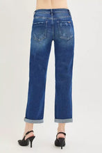 Blue denim risen slouchy cropped boyfriend jeans with faded wash and rolled cuffed hem in slouchy cropped boyfriend style