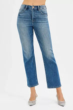 High-rise blue denim jeans with tummy control and a straight-leg cropped hem in the risen tummy control high rise crop straight jeans