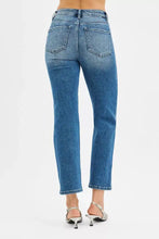 Back side of risen tummy control high rise crop straight jeans in mid-wash blue denim with classic back pockets