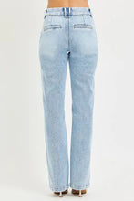 Back view of risen tummy control light-wash denim jeans with a comfortable feel and classic straight-leg cut pockets