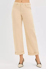 Beige risen tummy control mid rise wide-leg cropped trousers with rolled cuffs and minimalist design