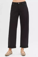 Black risen tummy control high-rise wide-leg trousers with ankle barrel rolled cuffs and a straight cut design