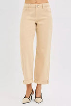 Beige risen tummy control mid rise ankle barrel jeans with straight leg, rolled cuffs, and classic five-pocket design