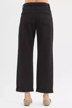 Black risen tummy control wide-leg trousers with straight cut ankle barrel and rolled cuffs for relaxed fit