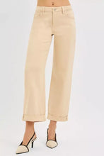 Beige wide-leg cropped jeans with rolled cuffs and classic five-pocket design in risen tummy control mid rise fit