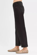 Black risen tummy control high-waisted trousers with ankle barrel straight-leg cut and rolled cuffs for a relaxed fit
