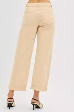 Beige risen tummy control wide-leg cropped trousers with rolled cuffs and a tailored fit for a relaxed look