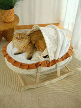Rocking pet bed with canopy, cream floral cradle, wooden rocking frame