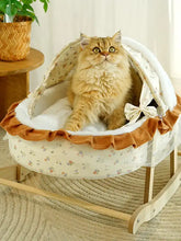 Fluffy golden cat in Rocking Pet Bed with Canopy, wooden frame, rocking motion