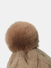 Light brown knit roll rim hat with fluffy pompom