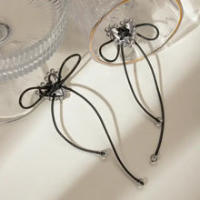 Black cord bracelet with silver beads, wax rope heart design