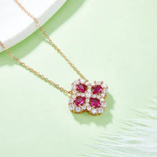 Rose gold clover necklace with lab-grown ruby gemstones