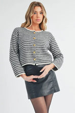 Round neck cardigan with gold buttons and black leather skirt set
