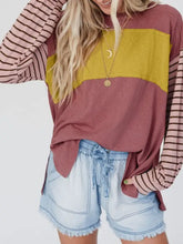 Round neck color block dropped shoulder T-shirt with striped sleeves and denim shorts