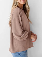 Light brown ribbed knit round neck drop shoulder long sleeve sweatshirt