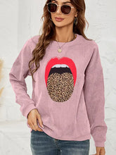Pink long-sleeved MAMA graphic sweatshirt with red lips leopard print