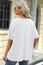 Women’s white oversized half sleeve round neck t-shirt