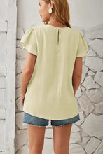 Round neck keyhole cap sleeve T-shirt in light yellow with denim shorts