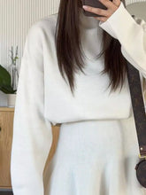 White oversized Round Neck Long Sleeve Mini Sweater Dress with relaxed fit and ribbed cuffs
