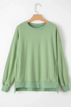 Light green round neck long sleeve sweatshirt with dropped shoulders