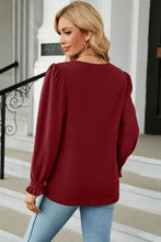 Women’s round neck long sleeve burgundy blouse with puffed shoulders