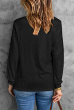 Womans black round neck long sleeve t-shirt top